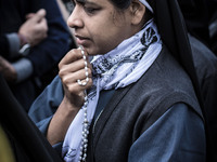 A nun prays during the apparition of Virgin Mary to Mirjana, on September 2, 2014. It was to Mirjana that Our Lady first entrusted all 10 se...