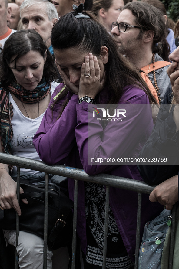 A woman prays during the apparition of Virgin Mary to Mirjana, on September 2, 2014. It was to Mirjana that Our Lady first entrusted all 10...