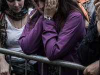 A woman prays during the apparition of Virgin Mary to Mirjana, on September 2, 2014. It was to Mirjana that Our Lady first entrusted all 10...