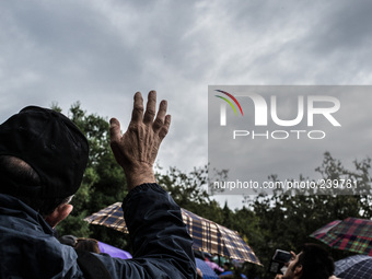 A man greets the Virgin Mary after the apparition of Virgin Mary to Mirjana, on September 2, 2014. It was to Mirjana that Our Lady first ent...