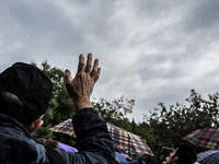 A man greets the Virgin Mary after the apparition of Virgin Mary to Mirjana, on September 2, 2014. It was to Mirjana that Our Lady first ent...