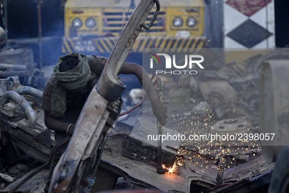 SAJAN KUMAR GUPTA, 20 yrs old, migrated from Motihara, India Cutting heavy duty Iron Metal of vehicles with Oxygen Acetylene Gas as Spark sp...