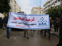 A march in support of the rights of Palestinian employees, hired by the former Hamas government in Gaza, demanding their rights and integrat...