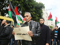 A march in support of the rights of Palestinian employees, hired by the former Hamas government in Gaza, demanding their rights and integrat...