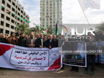 A march in support of the rights of Palestinian employees, hired by the former Hamas government in Gaza, demanding their rights and integrat...