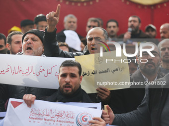 A march in support of the rights of Palestinian employees, hired by the former Hamas government in Gaza, demanding their rights and integrat...