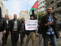 A march in support of the rights of Palestinian employees, hired by the former Hamas government in Gaza, demanding their rights and integrat...