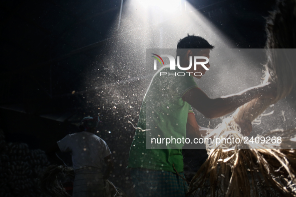 A jute worker works in a jute processing factory in Narayanganj, Bangladesh. January 7, 2018 