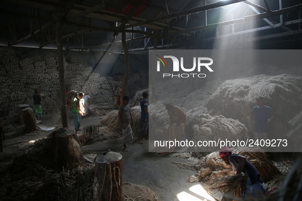 workers work in a jute processing factory in Narayanganj, Bangladesh. January 7, 2018 