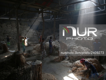 workers work in a jute processing factory in Narayanganj, Bangladesh. January 7, 2018 (