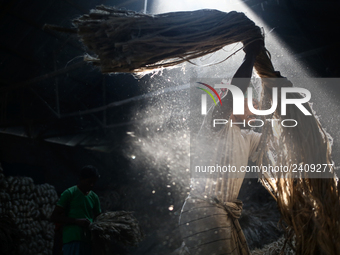 A jute worker works in a jute processing factory in Narayanganj, Bangladesh. January 7, 2018 (