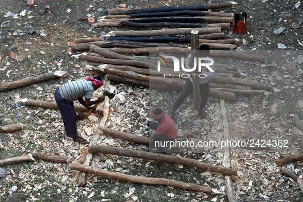 Labourers work at New Road contraction at howrah district ,around 16 kms West of Kolkata on January 15,2018 in Kolkata,India. 