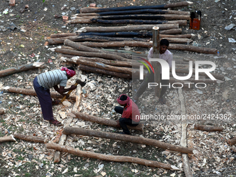 Labourers work at New Road contraction at howrah district ,around 16 kms West of Kolkata on January 15,2018 in Kolkata,India. (