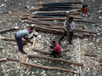 Labourers work at New Road contraction at howrah district ,around 16 kms West of Kolkata on January 15,2018 in Kolkata,India. (