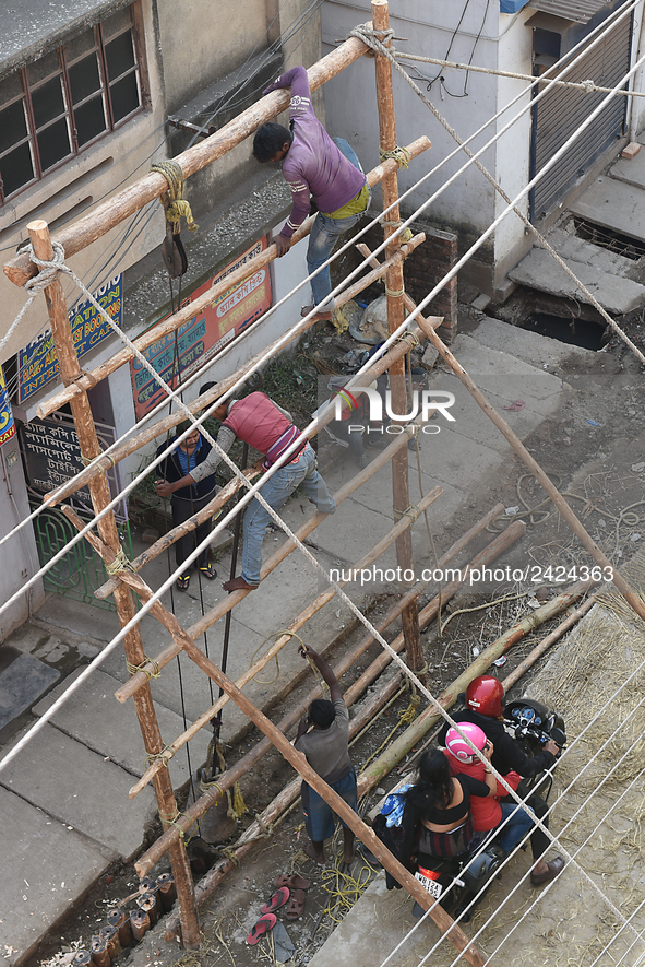 Labourers work at New Road contraction at howrah district ,around 16 kms West of Kolkata on January 15,2018 in Kolkata,India. 