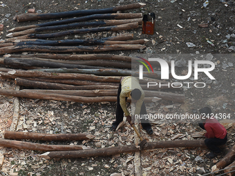 Labourers work at New Road contraction at howrah district ,around 16 kms West of Kolkata on January 15,2018 in Kolkata,India. (