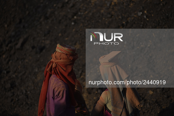 Migrant Indian labourer take rest in free time at a brick factory in Lalitpur, Nepal on Tuesday, January 23, 2018. Indian labourers carrys 1...