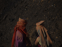 Migrant Indian labourer take rest in free time at a brick factory in Lalitpur, Nepal on Tuesday, January 23, 2018. Indian labourers carrys 1...