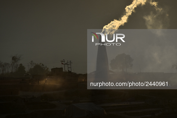 A view of Brick Kilns with chimney and smoke in Lalitpur, Nepal on Tuesday, January 23, 2018. 