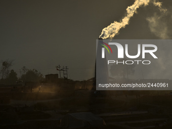 A view of Brick Kilns with chimney and smoke in Lalitpur, Nepal on Tuesday, January 23, 2018. (