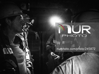 Italy, Sardinia 2013 Few miners in the lift tools used to go rapidly into the mine, 5 minutes is also the time  that it takes to reach the s...