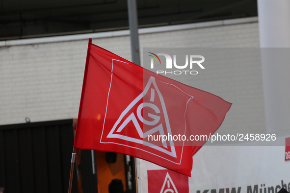 IG Metall is seen during a strike at a BMW factory site in Munich, Germany, 2 February 2017.. A few thousand came to the rally in front of t...