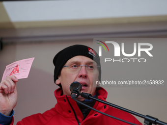 Horst Lischka holding a striking card from 1995 during a strike at a BMW factory site in Munich, Germany, 2 February 2017.. A few thousand c...