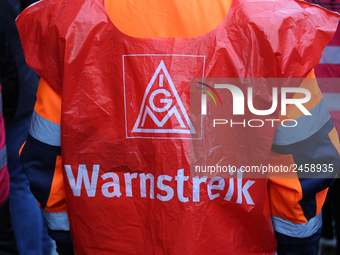 IG Metall - warn strike taking part in a strike at a BMW factory site in Munich, Germany, 2 February 2017. A few thousand came to the rally...