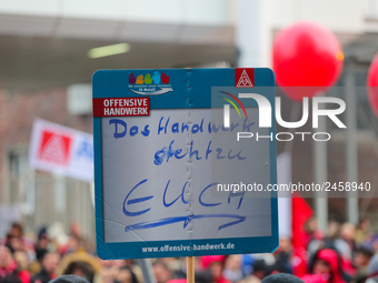 Solidarity from the craft is seen during a strike at a BMW factory site in Munich, Germany, 2 February 2017.. A few thousand came to the ral...