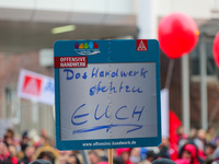 Solidarity from the craft is seen during a strike at a BMW factory site in Munich, Germany, 2 February 2017.. A few thousand came to the ral...