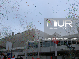 Confetti in the air is seen during a strike at a BMW factory site in Munich, Germany, 2 February 2017. A few thousand came to the rally in f...