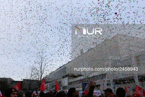 Confetti in the air is seen during a strike at a BMW factory site in Munich, Germany, 2 February 2017. A few thousand came to the rally in f...