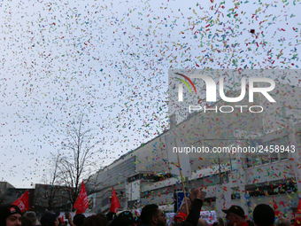 Confetti in the air is seen during a strike at a BMW factory site in Munich, Germany, 2 February 2017. A few thousand came to the rally in f...