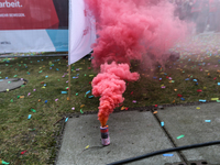 Smoke bombs is seen during a strike at a BMW factory site in Munich, Germany, 2 February 2017. A few thousand came to the rally in front of...