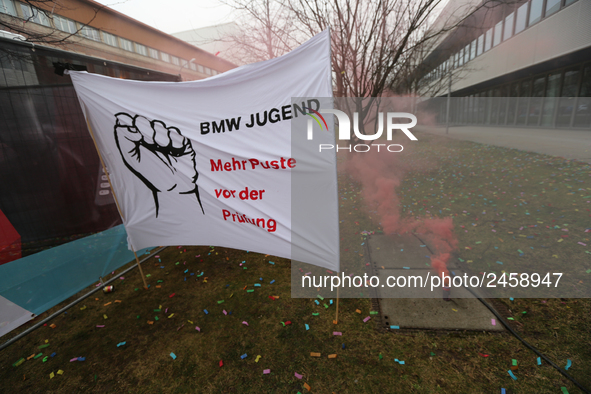 Smoke bombs Confetti is seen during a strike at a BMW factory site in Munich, Germany, 2 February 2017. A few thousand came to the rally in...