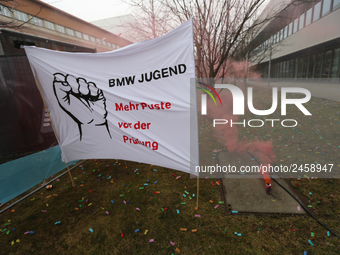 Smoke bombs Confetti is seen during a strike at a BMW factory site in Munich, Germany, 2 February 2017. A few thousand came to the rally in...