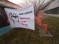 Smoke bombs Confetti is seen during a strike at a BMW factory site in Munich, Germany, 2 February 2017. A few thousand came to the rally in...