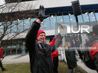 Striking worker is seen during a strike at a BMW factory site in Munich, Germany, 2 February 2017.. A few thousand came to the rally in fron...