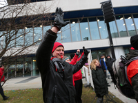 Striking worker is seen during a strike at a BMW factory site in Munich, Germany, 2 February 2017.. A few thousand came to the rally in fron...