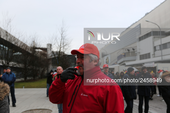 Striking worker blowing the whistle during a strike at a BMW factory site in Munich, Germany, 2 February 2017.. A few thousand came to the r...