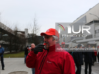 Striking worker blowing the whistle during a strike at a BMW factory site in Munich, Germany, 2 February 2017.. A few thousand came to the r...