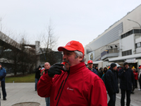 Striking worker blowing the whistle during a strike at a BMW factory site in Munich, Germany, 2 February 2017.. A few thousand came to the r...