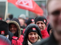 Striking workers during a strike at a BMW factory site in Munich, Germany, 2 February 2017.. A few thousand came to the rally in front of th...