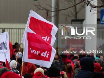 Verdi flags Confetti is seen during a strike at a BMW factory site in Munich, Germany, 2 February 2017.. A few thousand came to the rally in...