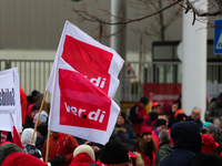 Verdi flags Confetti is seen during a strike at a BMW factory site in Munich, Germany, 2 February 2017.. A few thousand came to the rally in...