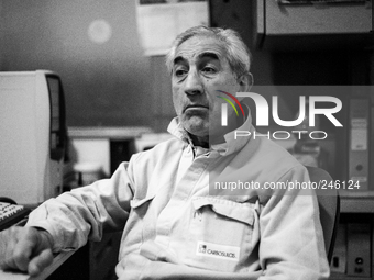 Italy, Sardinia December 2014 One of the first miners employed in the mine thinking about his close retirement and at the same the time look...