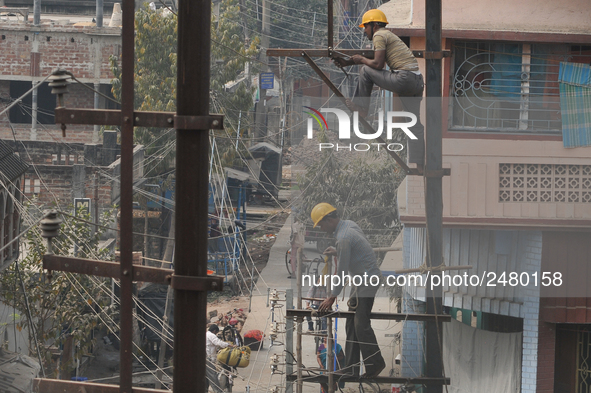 Labour work Road side Electrical post on February  13, 2018 in Kolkata City , India. 