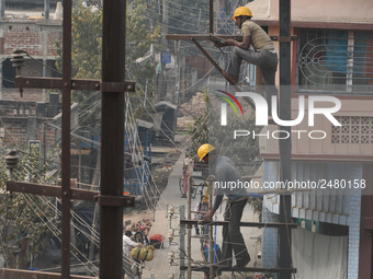 Labour work Road side Electrical post on February  13, 2018 in Kolkata City , India. (