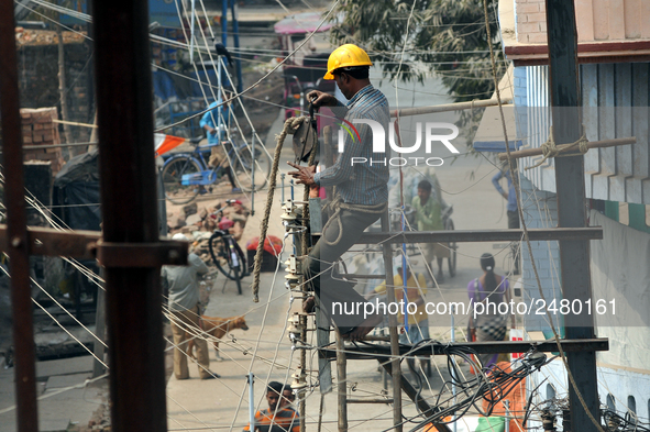 Labour work Road side Electrical post on February  13, 2018 in Kolkata City , India. 