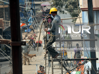 Labour work Road side Electrical post on February  13, 2018 in Kolkata City , India. (